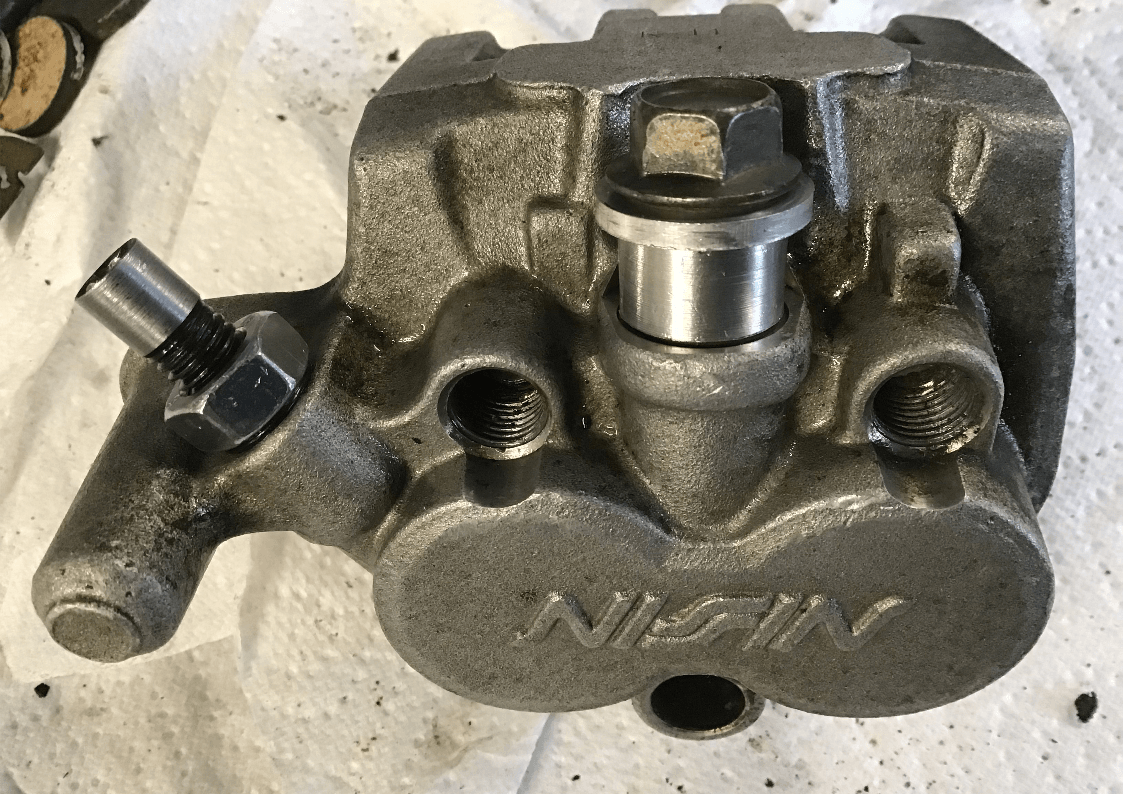 YZ125 seized brake piston removal