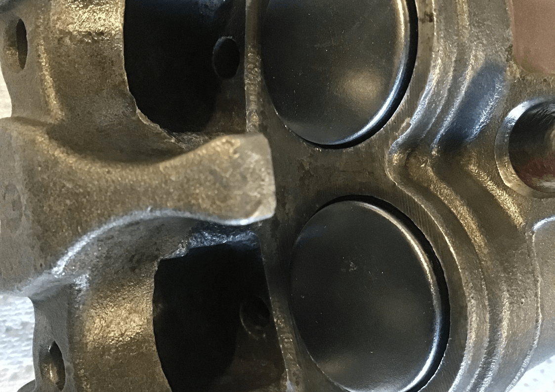 New brake pistons installed in YZ125 caliper