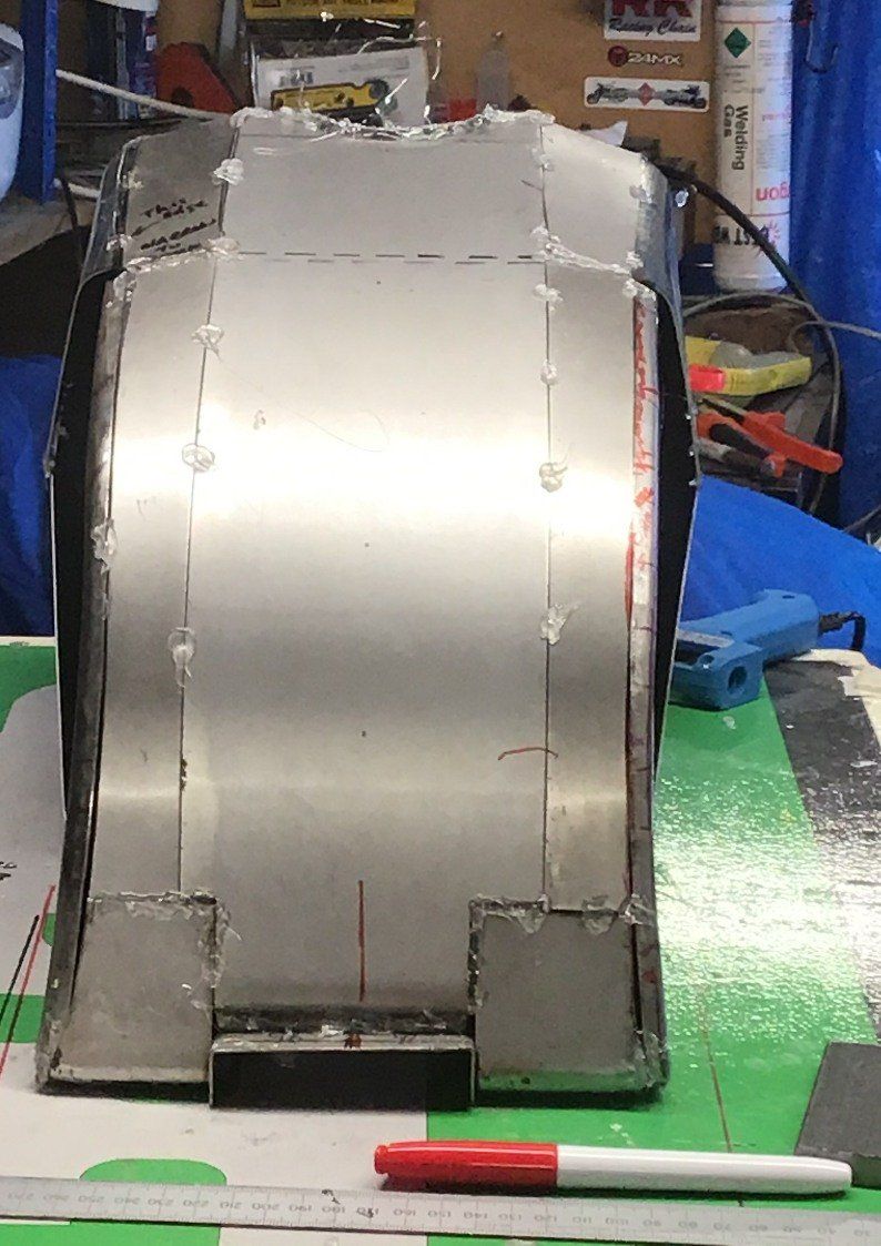 Second fitting of fabricated steel petrol tank side