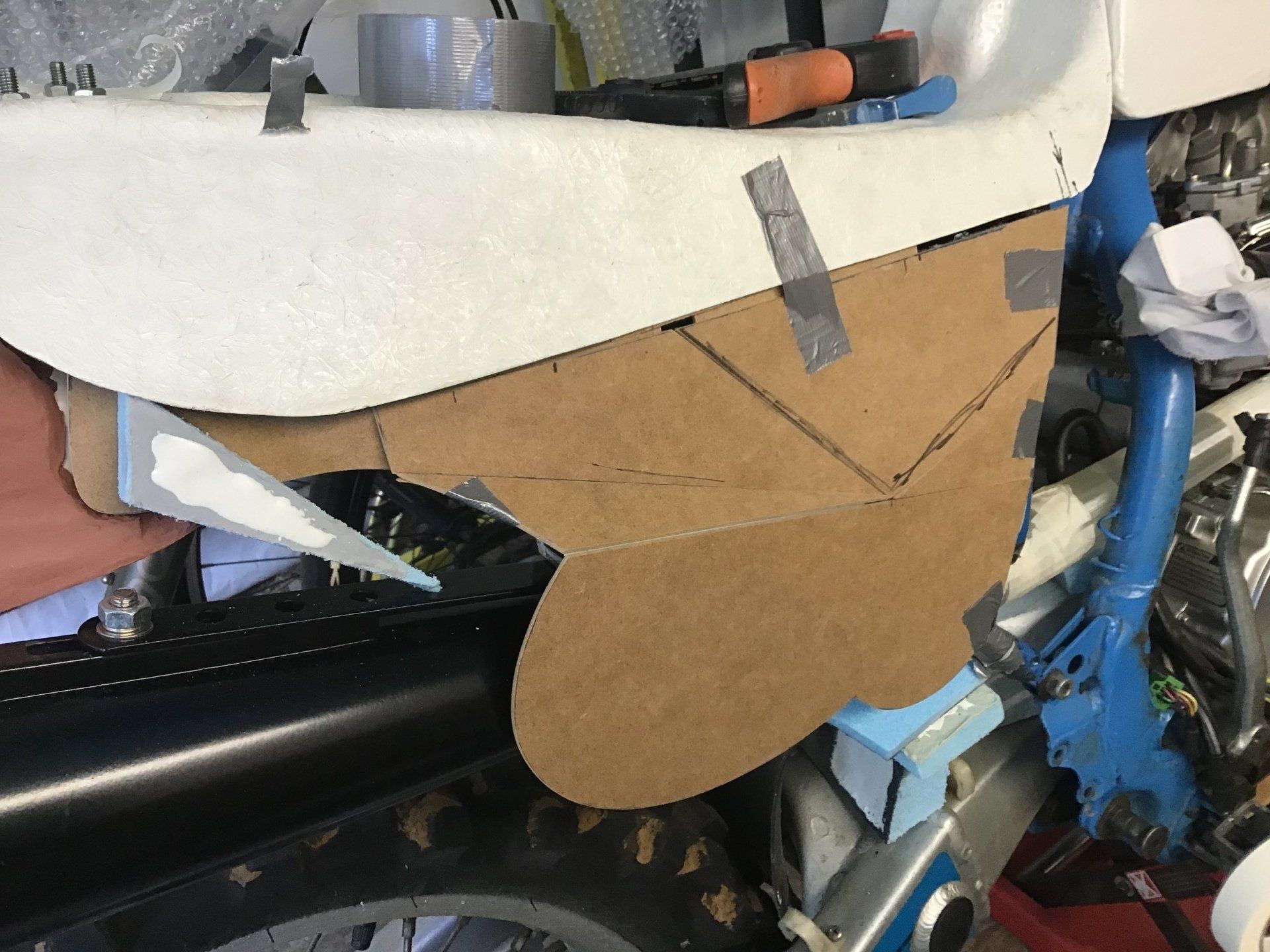 Shaping the motorcycle side panel