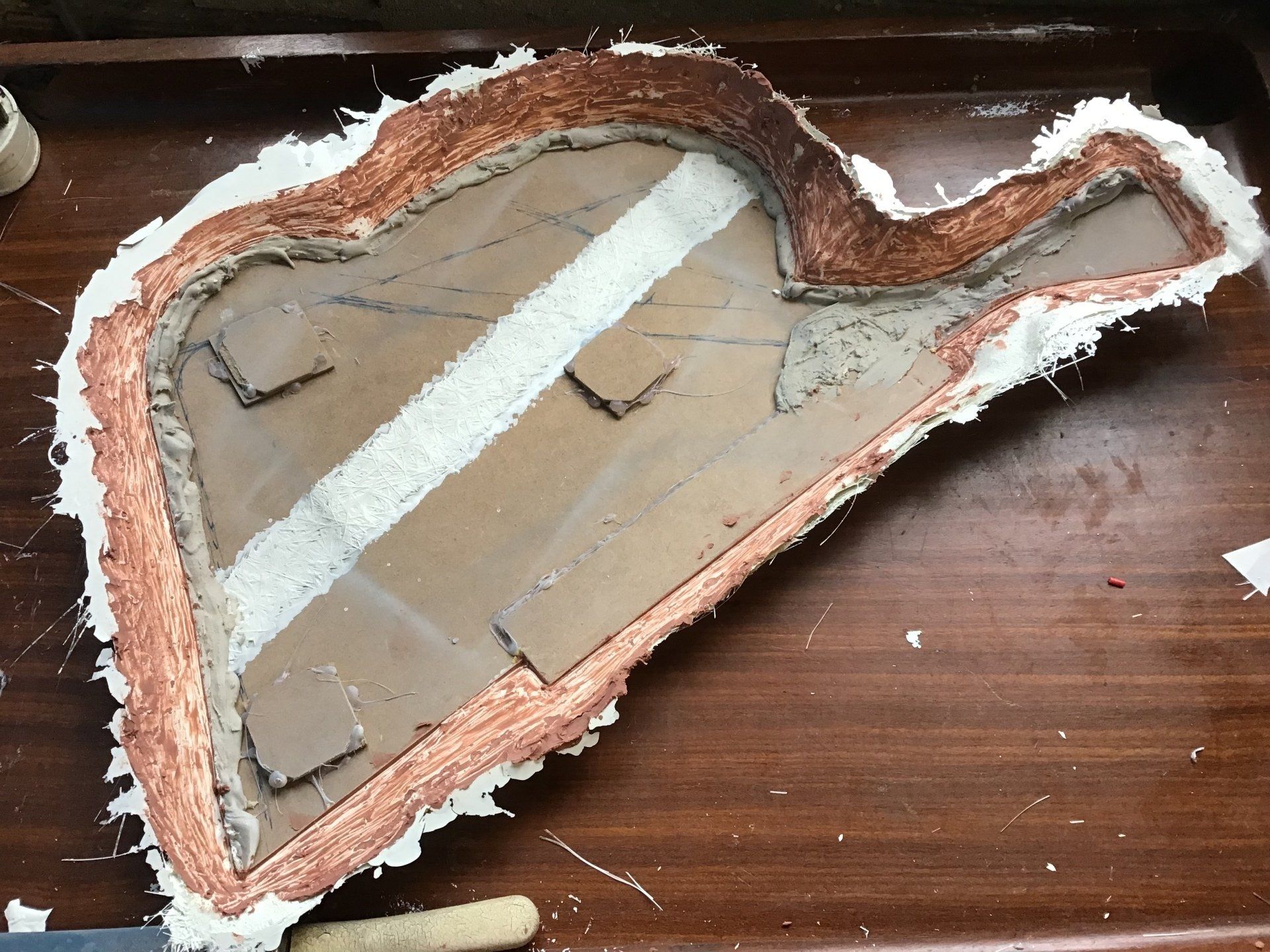 Removing Chavant clay from side panel mould