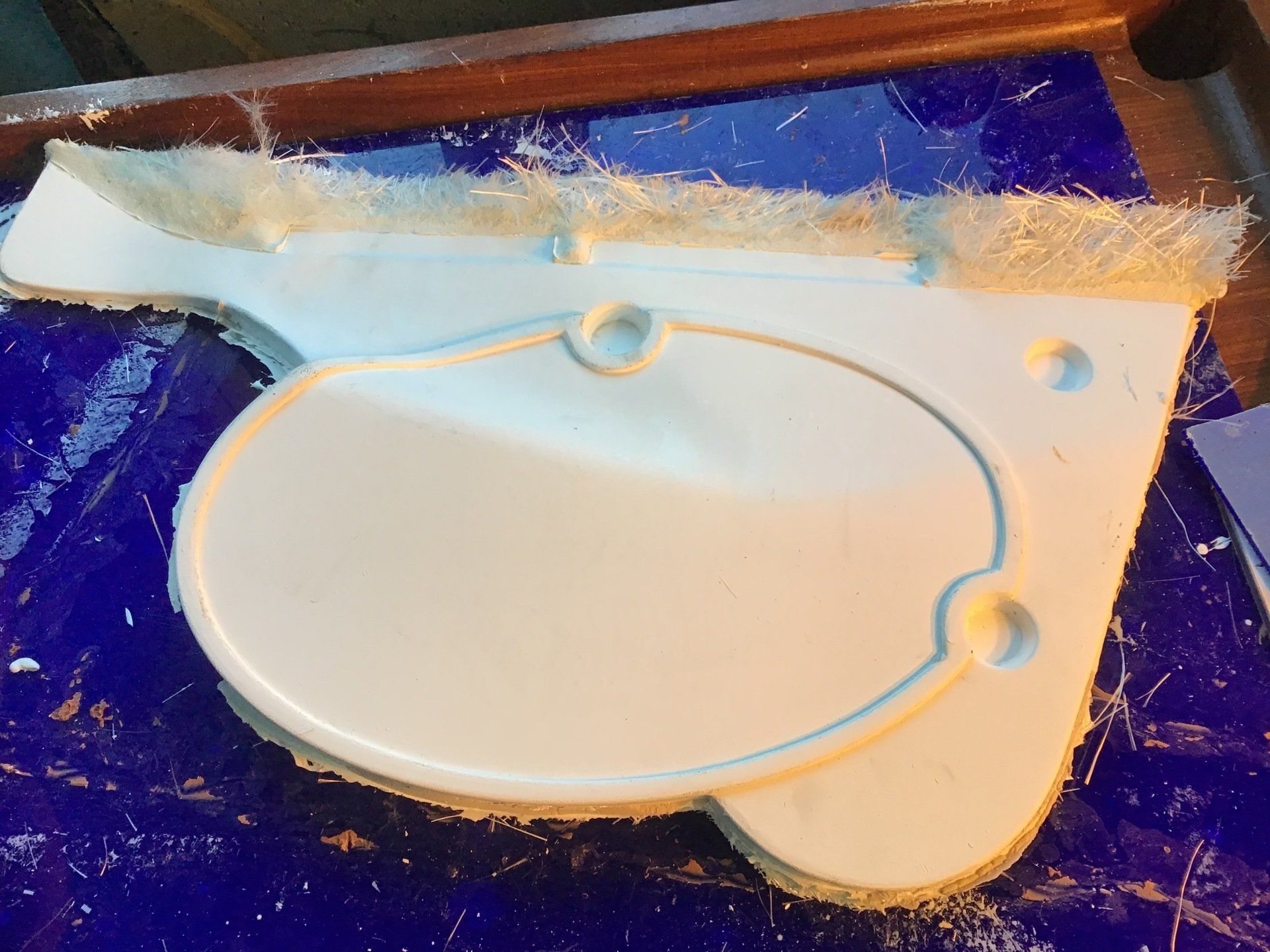 Side panel released from the mould