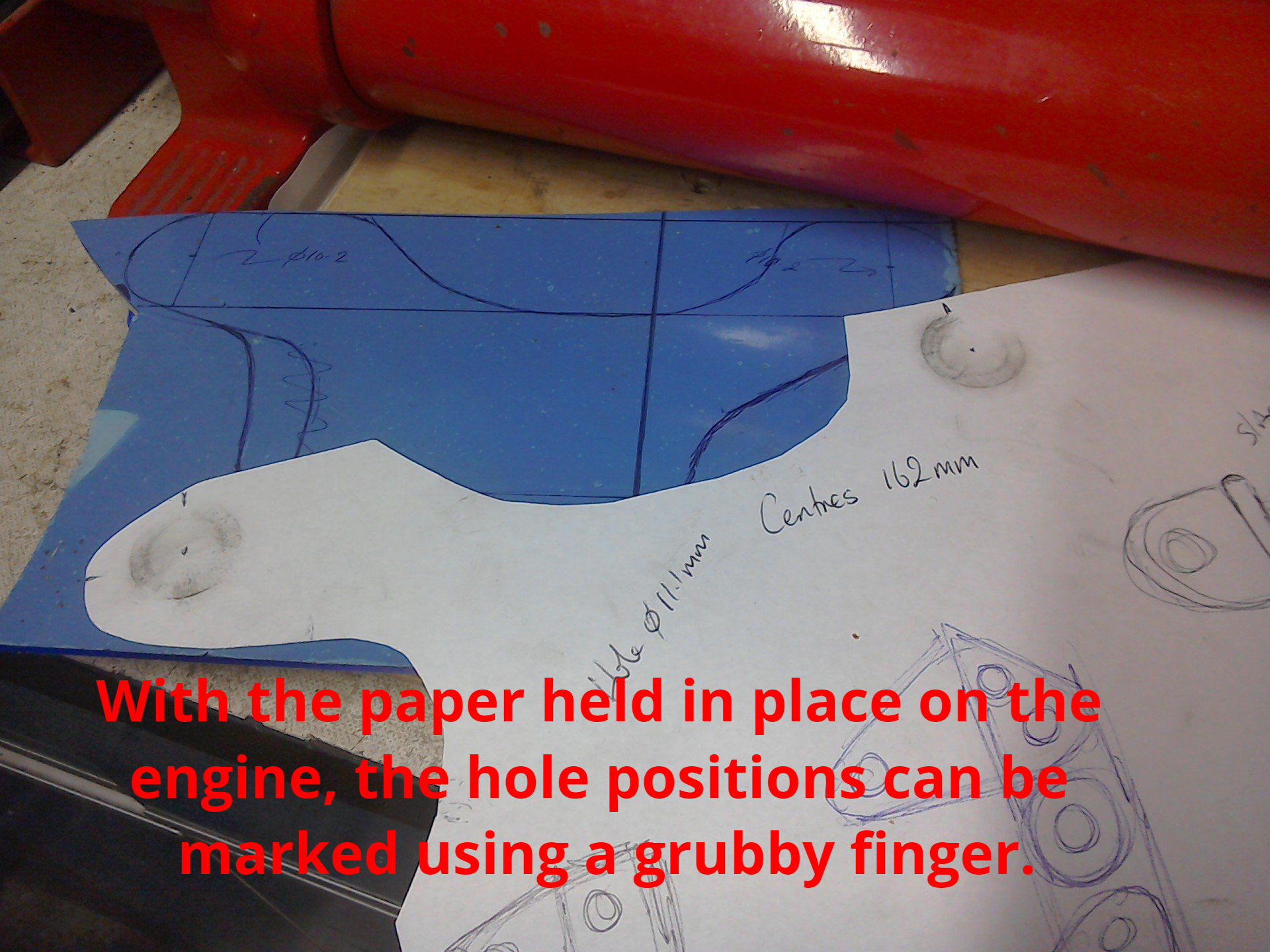 marking hole positions with a greasy finger