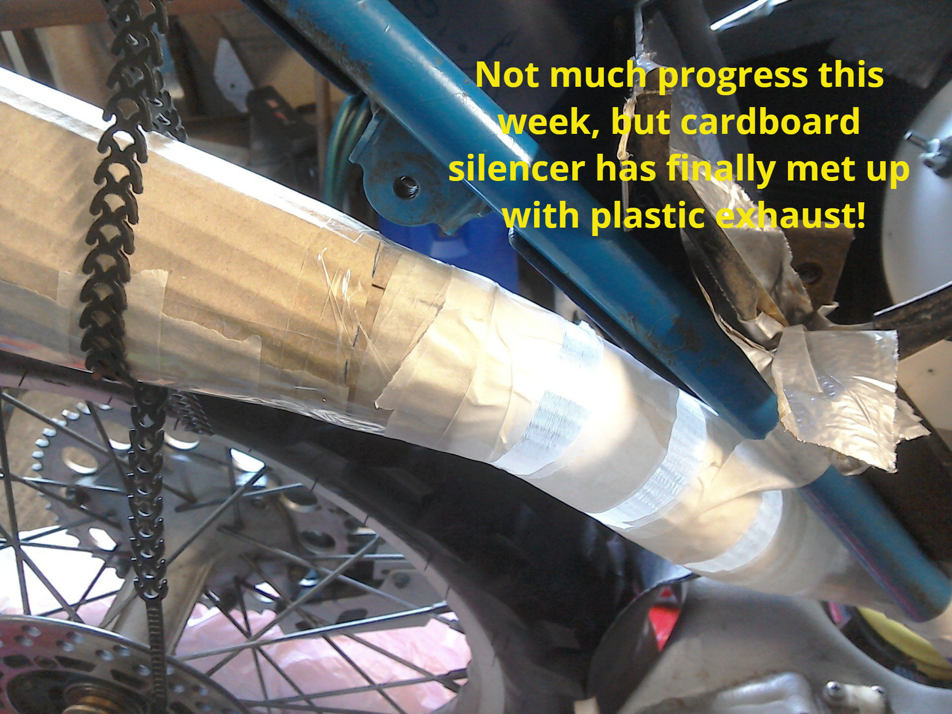 Plastic exhaust meets cardboard silencer