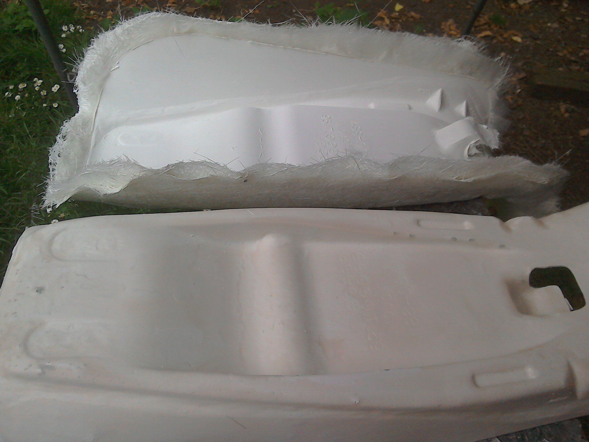 Fibreglass seat base released from mould