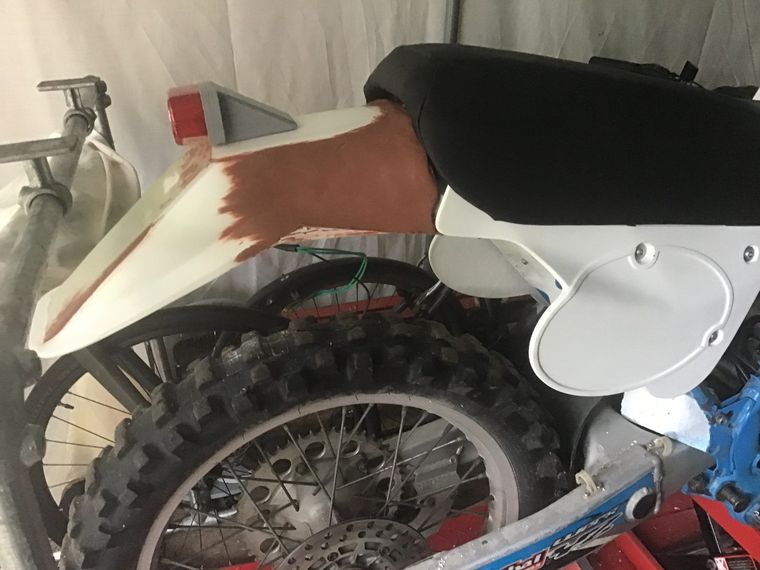 Modifying rear motorcycle mudguard