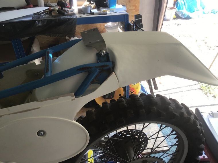 Rear mudguard and side panel fit
