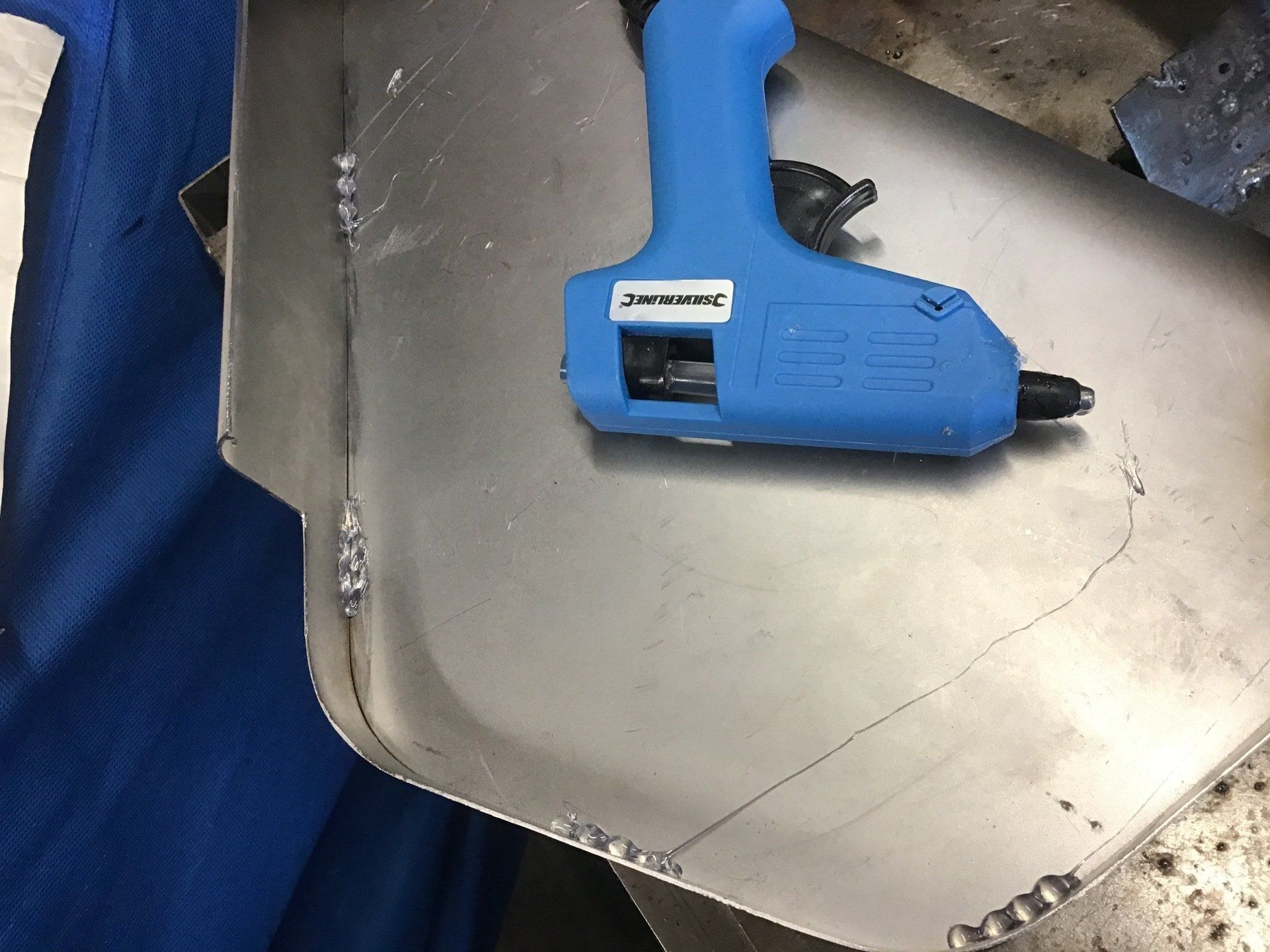 Sheet metal parts temporarily held in place using a Silverline glue gun
