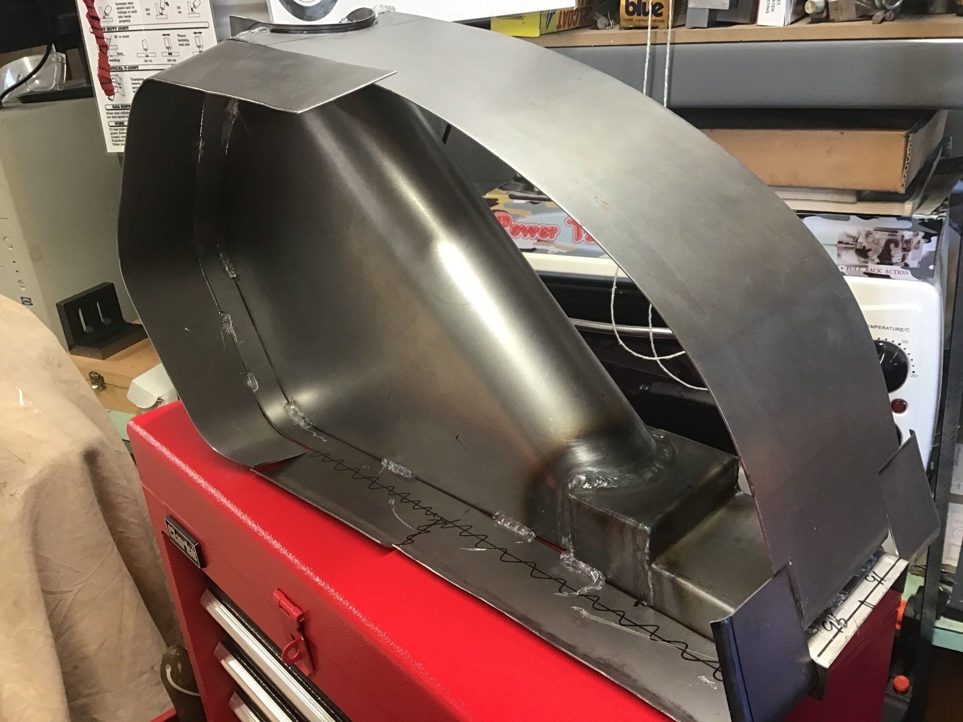 Fitting top of motorcycle petrol tank