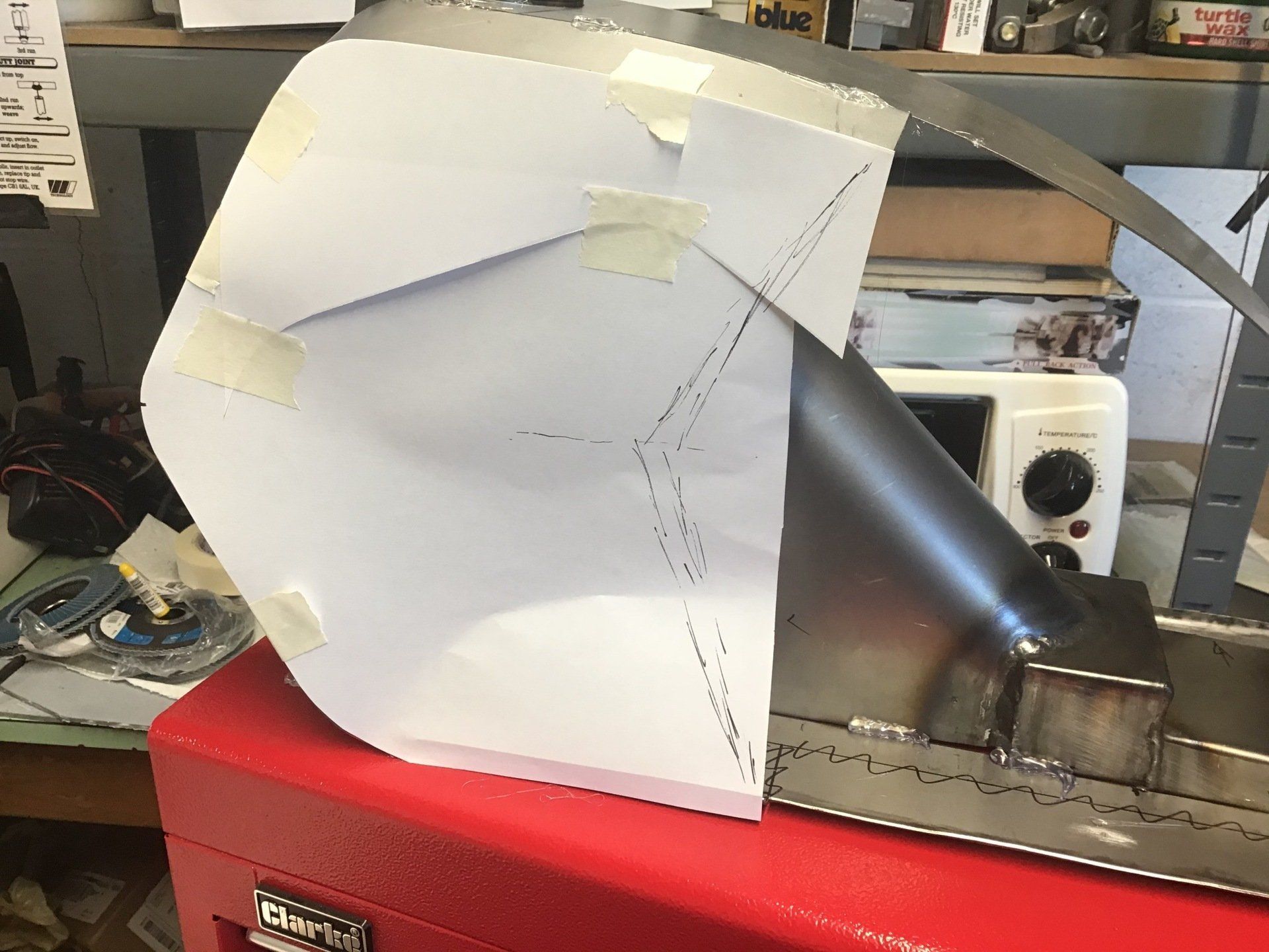 Paper template for side of motorcycle petrol tank