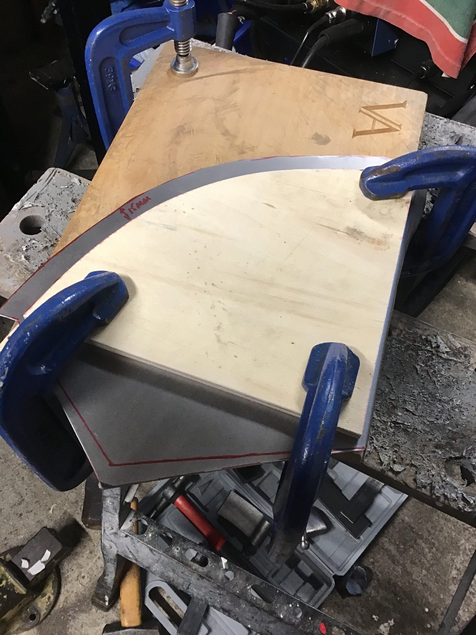 Hammer forming side of bike fuel tank