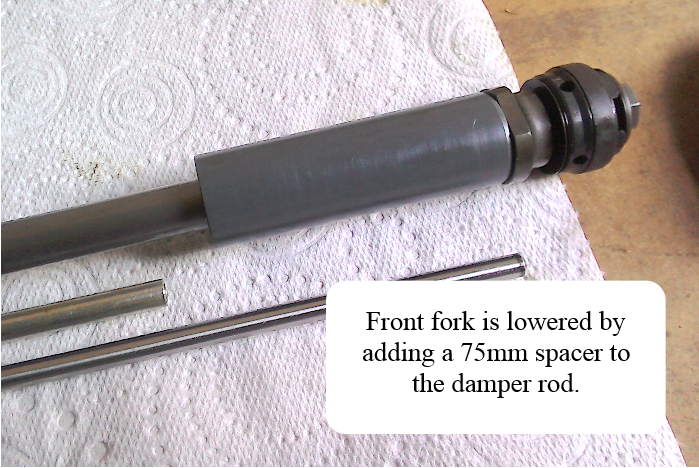 Spacer fitted to fork damper rod.
