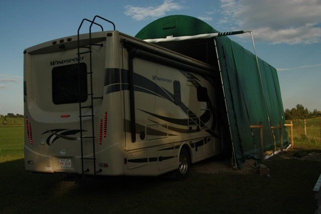 GREEN FABRIC COVER-TECH RV PORTABLE GARAGE AND TEMPORARY BOAT SHELTERS TOLL FREE: 1 888 325-5757