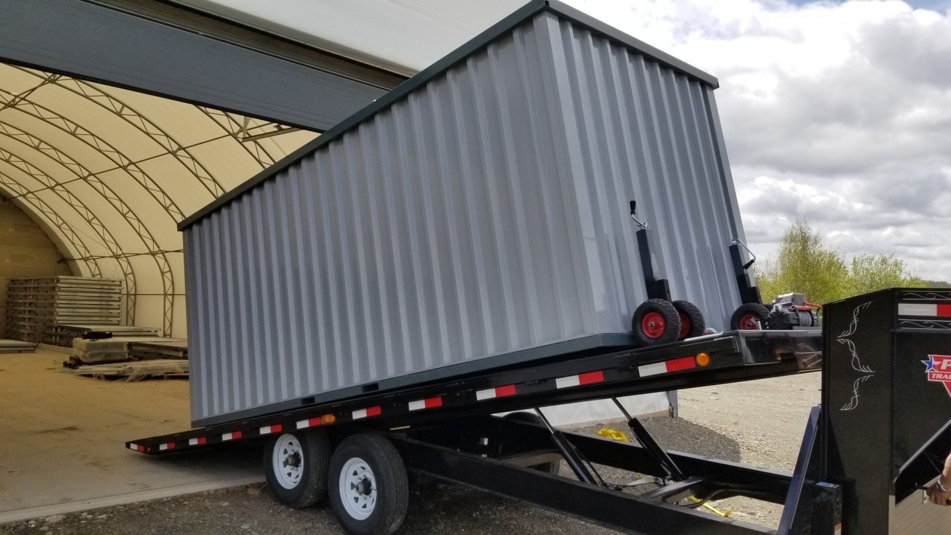Cover-Tech portable storage containers can be loaded to trailers