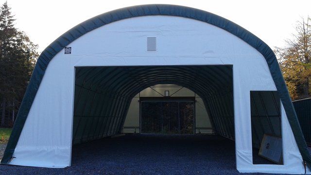 COVER-TECH TEMPORARY FABRIC SHELTER FOR HEAVY TRUCKS THAT IS PORTABLE TOLL FREE: 1 888 325-5757