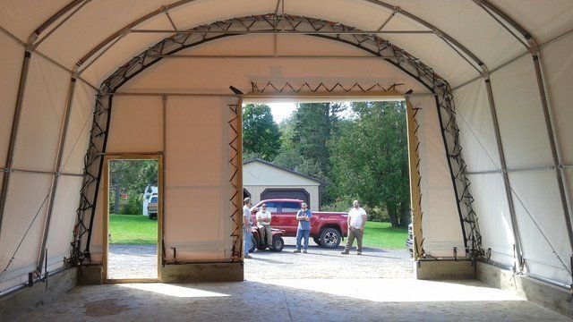 COVER-TECH INC. HEAVY TRUCK PORTABLE GARAGE WITH BEIGE SHELTER FABRIC TOLL FREE: 1 888 325-5757