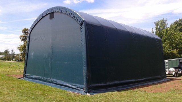 COVER-TECH INC. HEAVY TRUCK PORTABLE GARAGE WITH DARK GREEN SHELTER FABRIC TOLL FREE: 1 888 325-5757