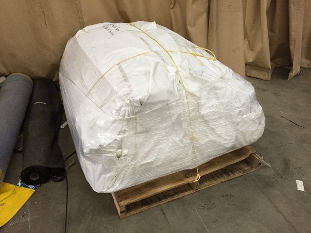 Cover-Tech Inc.: Before and after folding a 100' x 150', 16 mil stockpile cover