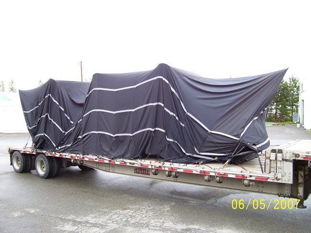 Cover-Tech Inc. flatbed tarps Super lightweight ballistic truck tarps covering airplane propellers
