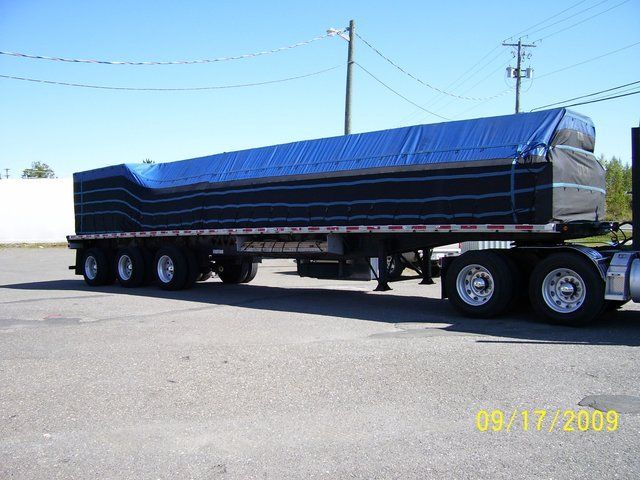 Cover-Tech Inc. Flatbed Tarps Truck tarp shown above with an 18 oz vinyl top and super lightweight sides