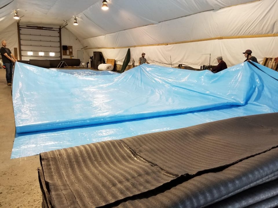 Cover-Tech Inc. custom made  insulated tarps being used to cure concrete for Muskrat Falls.