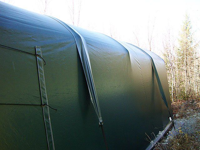 WIND STRAPS INCLUDED WITH ALL COVER-TECH PORTABLE FABRIC SHELTERS TOLL FREE: 1 888 325-5757