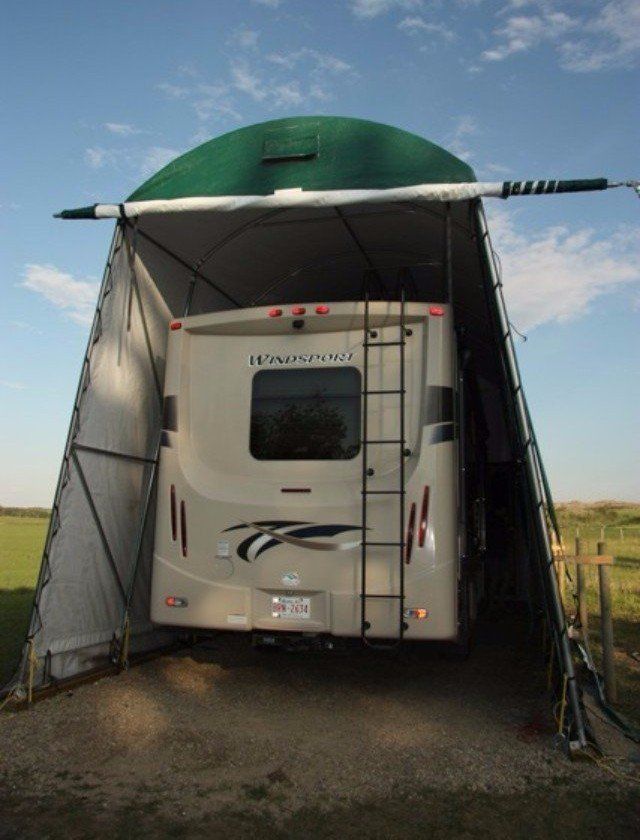 COVER-TECH INC. GREEN FABRIC RV PORTABLE GARAGE AND TEMPORARY BOAT SHELTER SOLUTION TOLL FREE: 1 888 325-5757