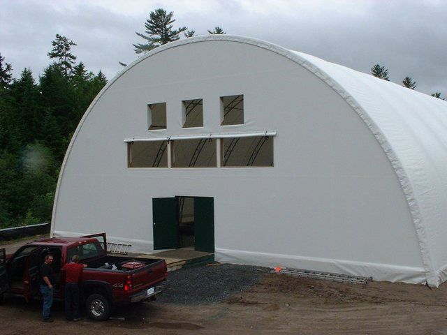 COVER-TECH DOME BUILDINGS fabric buildings 55' x 150' covering salmon tanks