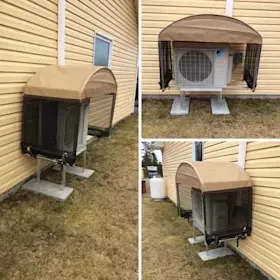 A picture of an air conditioner on the side of a house