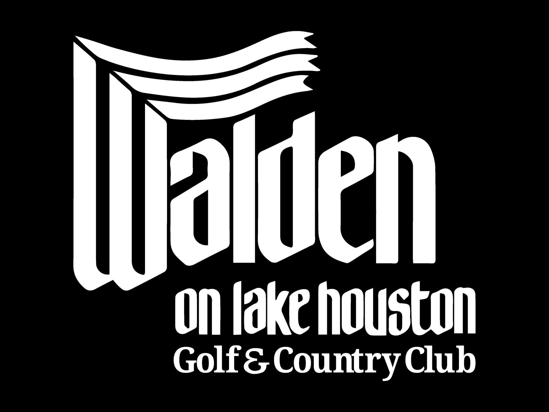 Woman with long graying hair, smiling, wearing a black jacket over a yellow floral blouse.