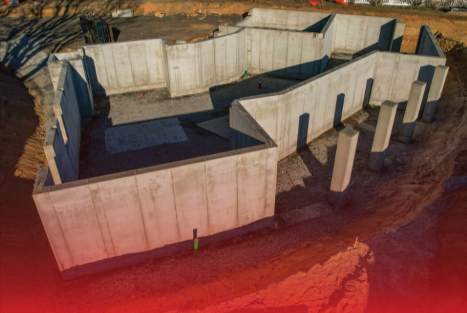 An aerial view of a concrete basement under construction.
