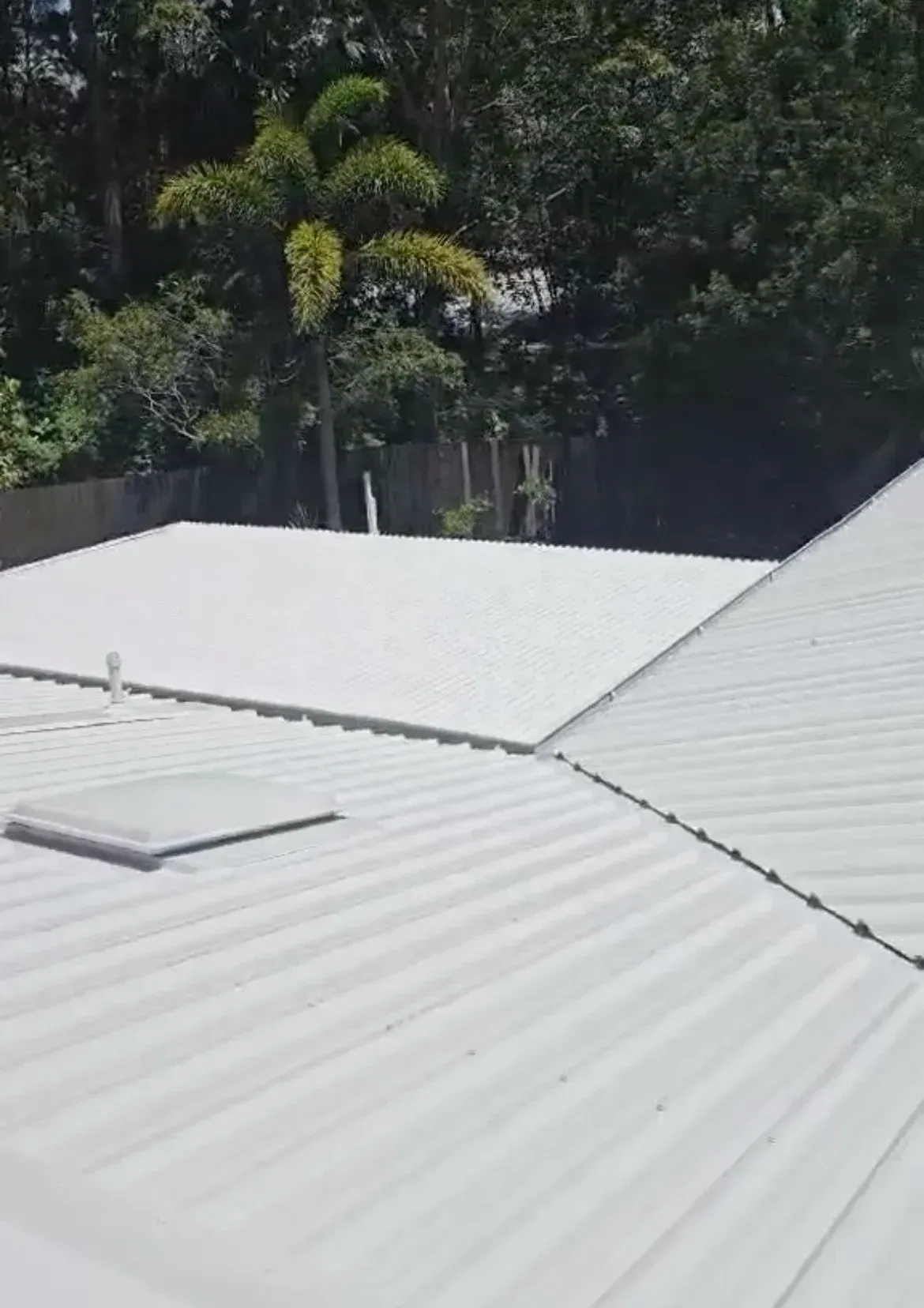 A High-angle View of a White Corrugated Metal Roof — MVP Painting Professionals in Sunshine Coast, QLD