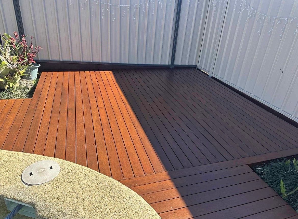 Wooden deck with reddish-brown planks — MVP Painting Professionals in Kawana, QLD