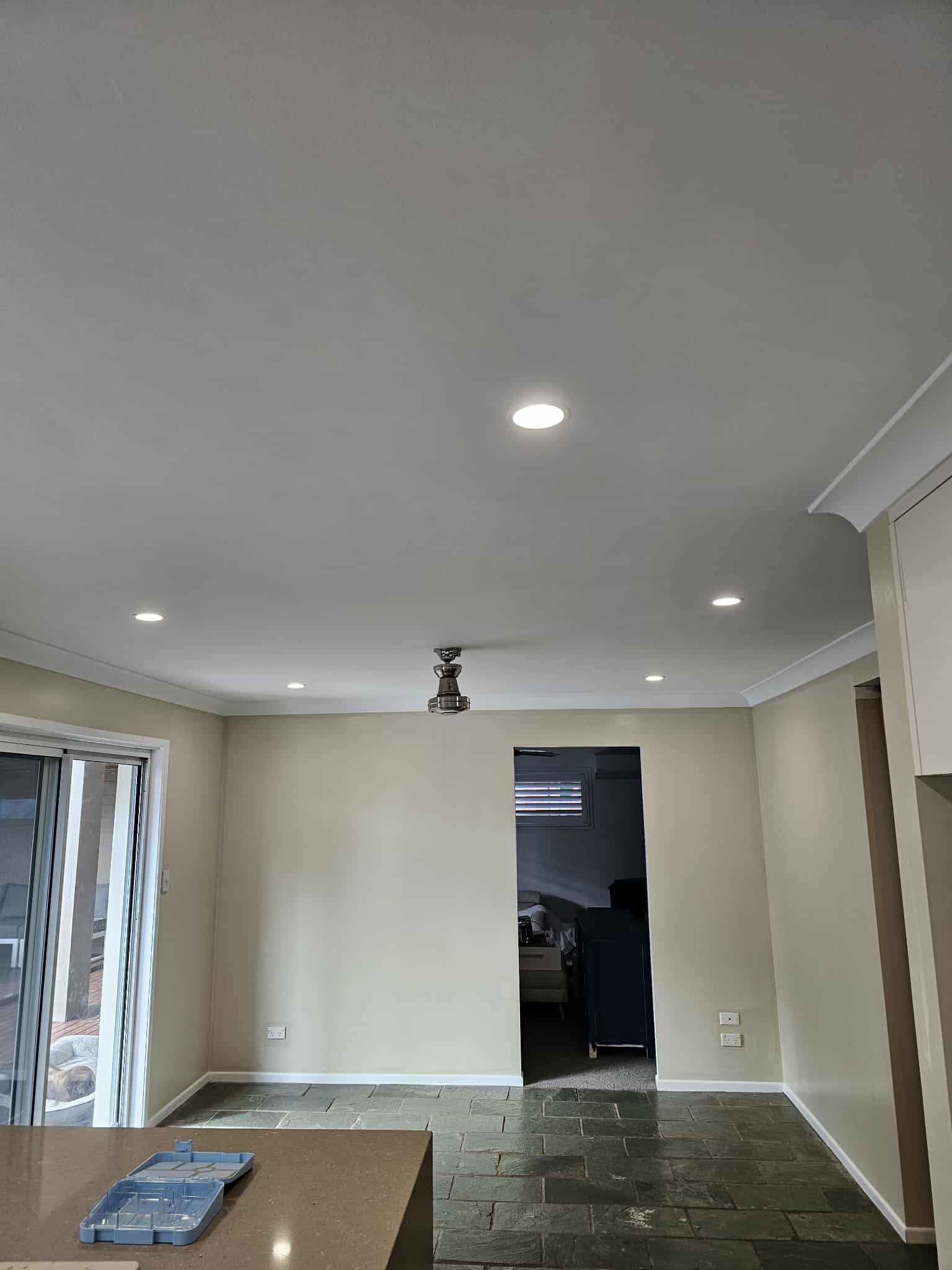 Interior with recessed lights, crown moulding, a ceiling fan, and a doorway — MVP Painting Professionals in Nambour, QLD