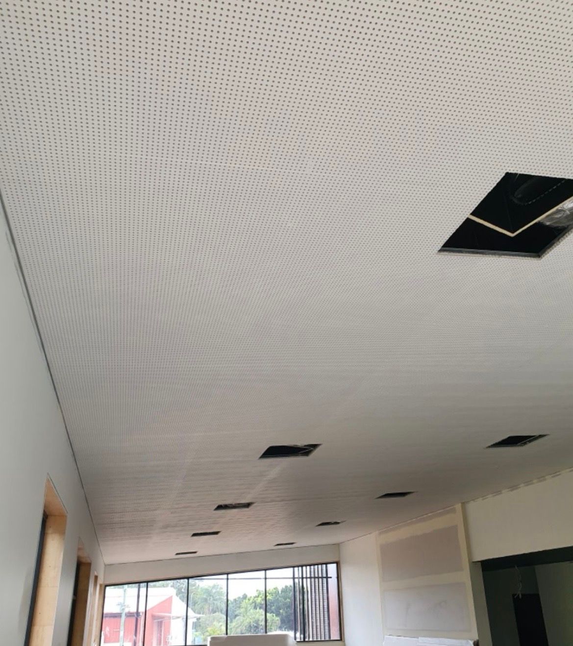 White perforated ceiling with several open square access panels room — MVP Painting Professionals in Nambour, QLD