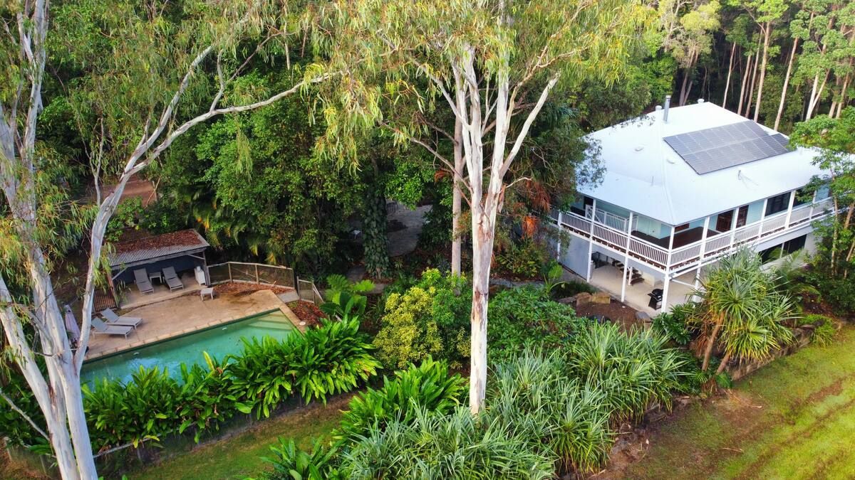 House with white veranda and solar panels — MVP Painting Professionals in Sunshine Coast, QLD