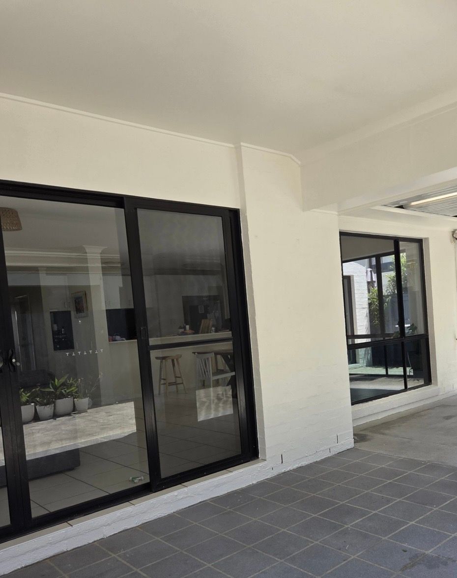 Exterior View of a Modern Building With Large Black-framed Windows — MVP Painting Professionals in Glass House Mountains, QLD 