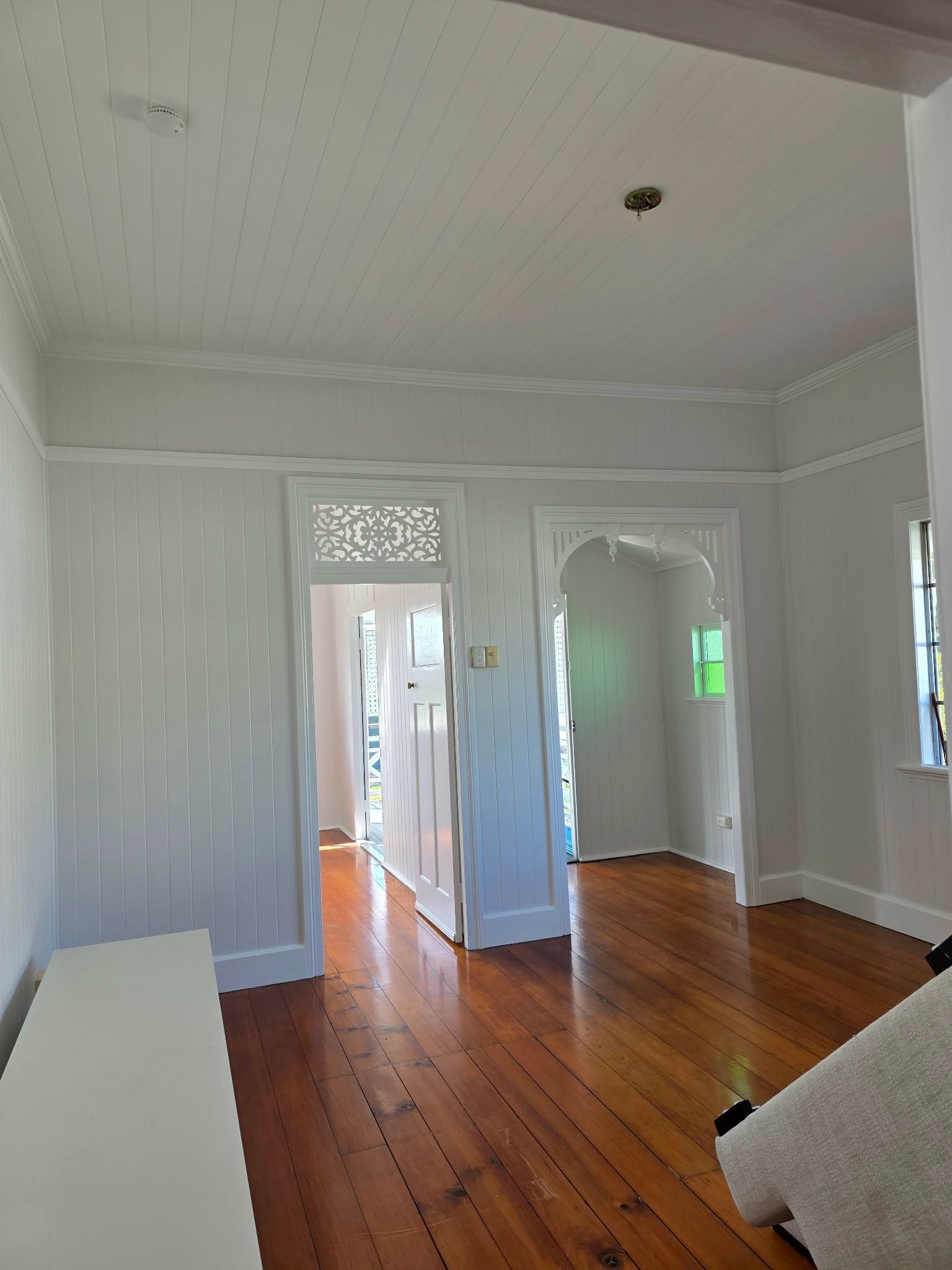 Interior view of a white room with hardwood floors — MVP Painting Professionals in Sunshine Coast, QLD