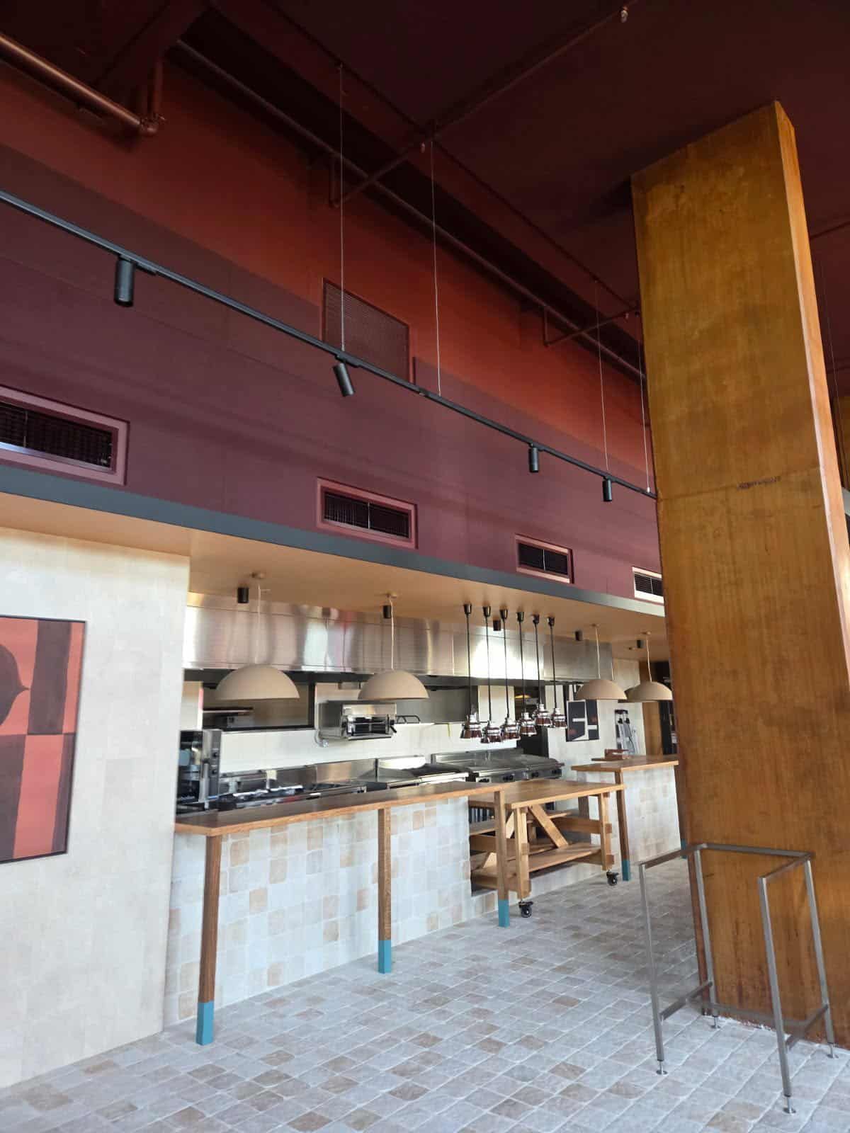 Interior of a Restaurant Kitchen With Stainless Steel — MVP Painting Professionals in Sunshine Coast, QLD