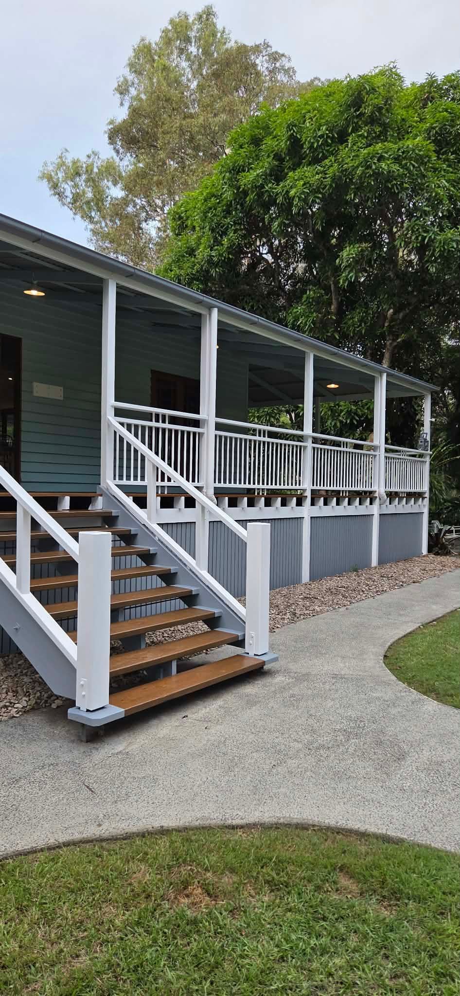 Light Blue House With a Wide Porch — MVP Painting Professionals in Sunshine Coast, QLD