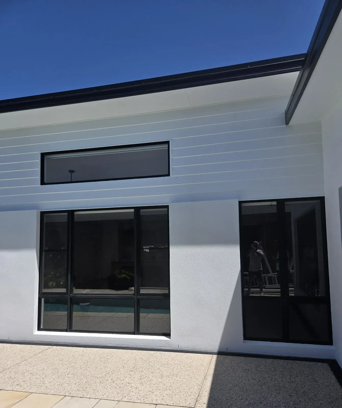 A White Modern House Exterior — MVP Painting Professionals in Sunshine Coast, QLD