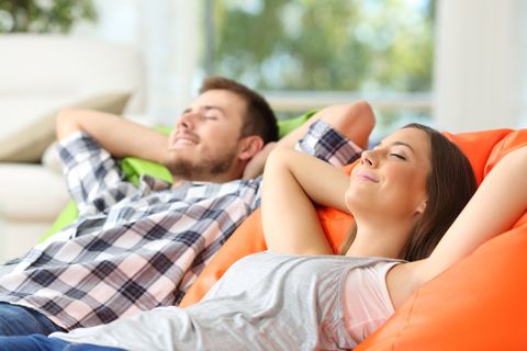 people relaxing in home