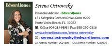 A woman is standing in front of a business card for a financial advisor.