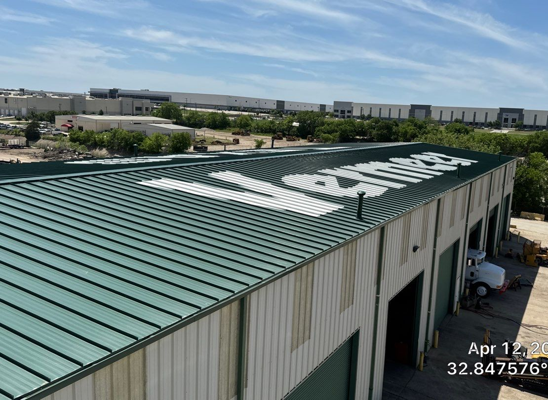 Living room with hardwood floors, sofa, staircase, and decorative accents.