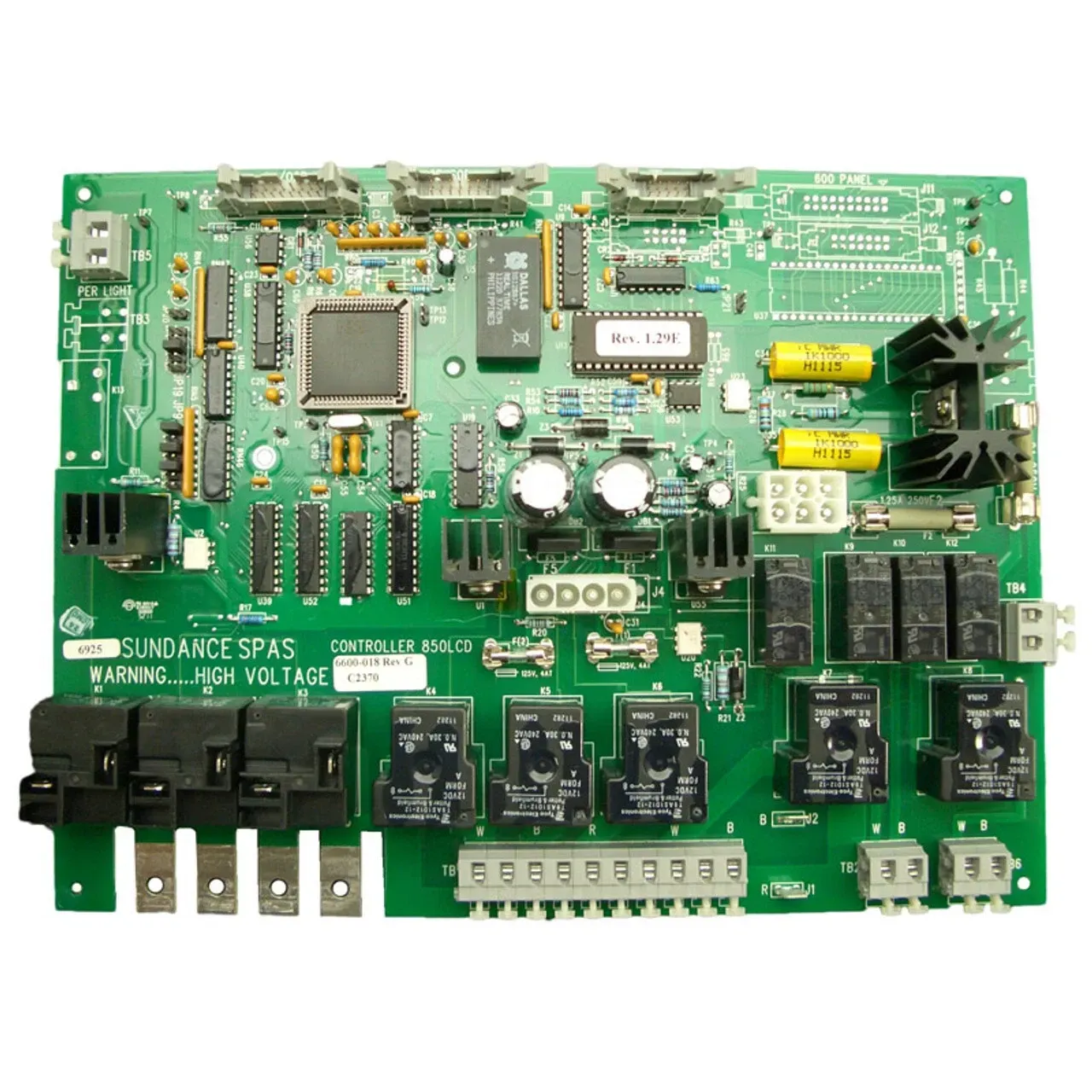 Green circuit board with various electronic components; labeled 
