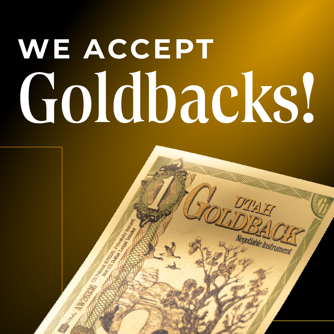 A gold circular sticker that says 