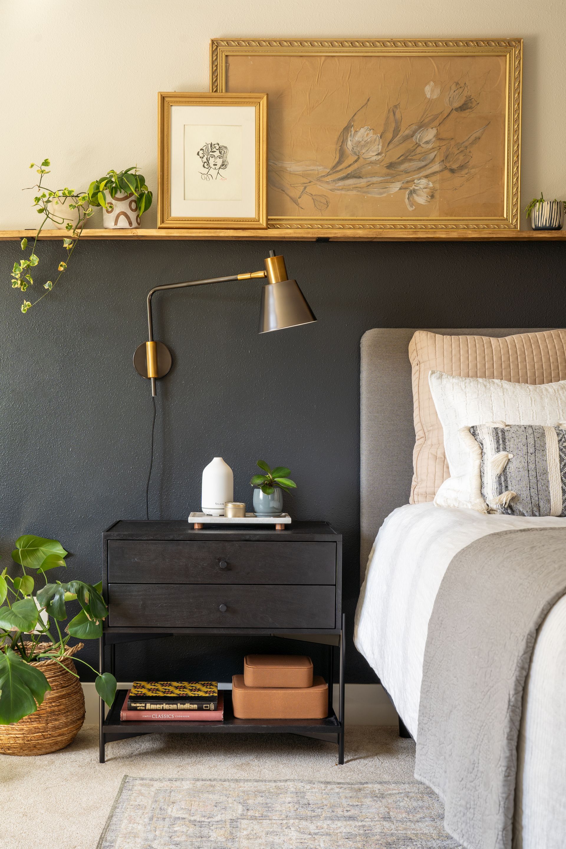 A bedroom with a bed , nightstand , lamp and a shelf in Seattle, WA. Allison Myers Design. Emily Barrows Photography. 