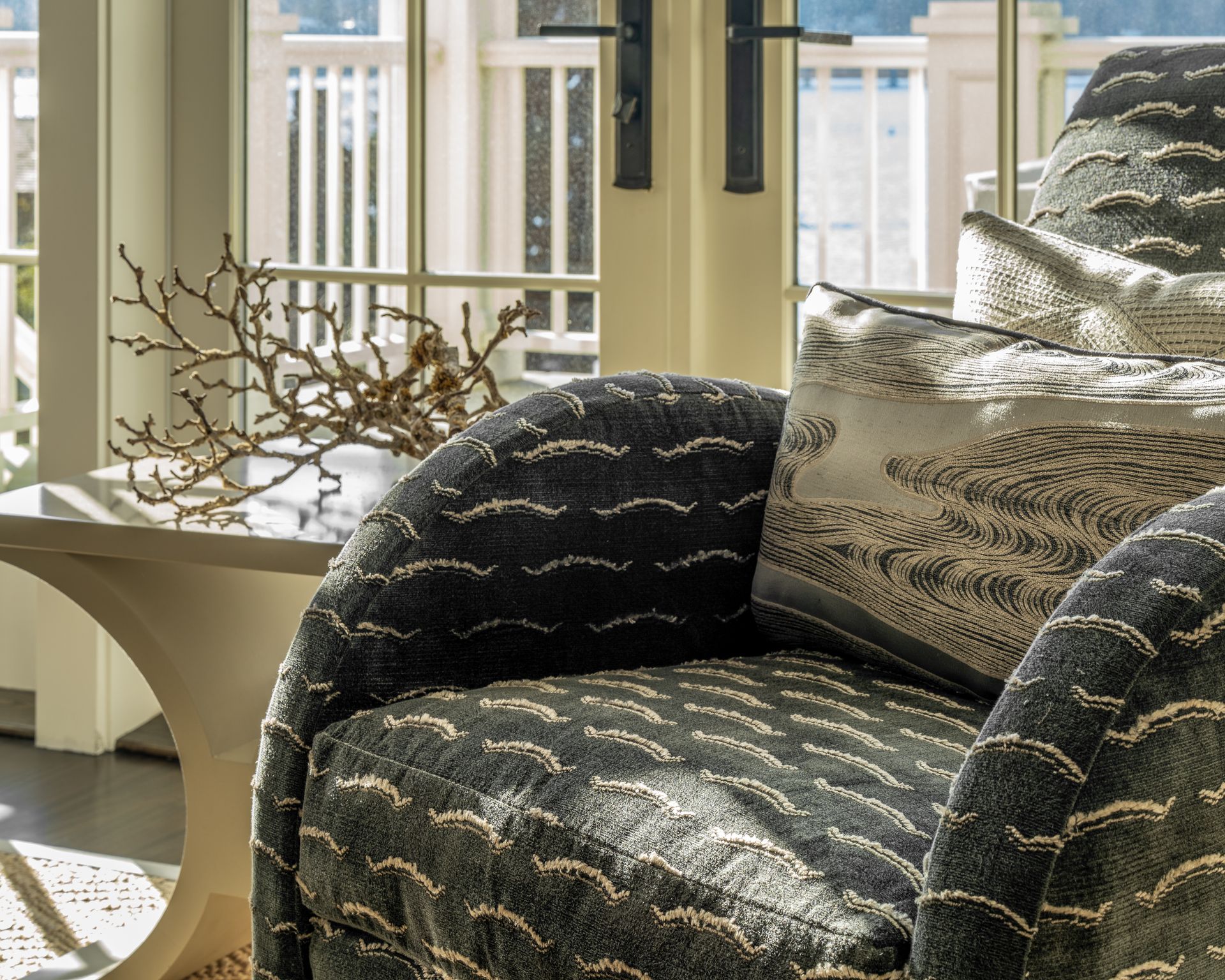 A chair and a table in front of a window. Seattle, WA. 