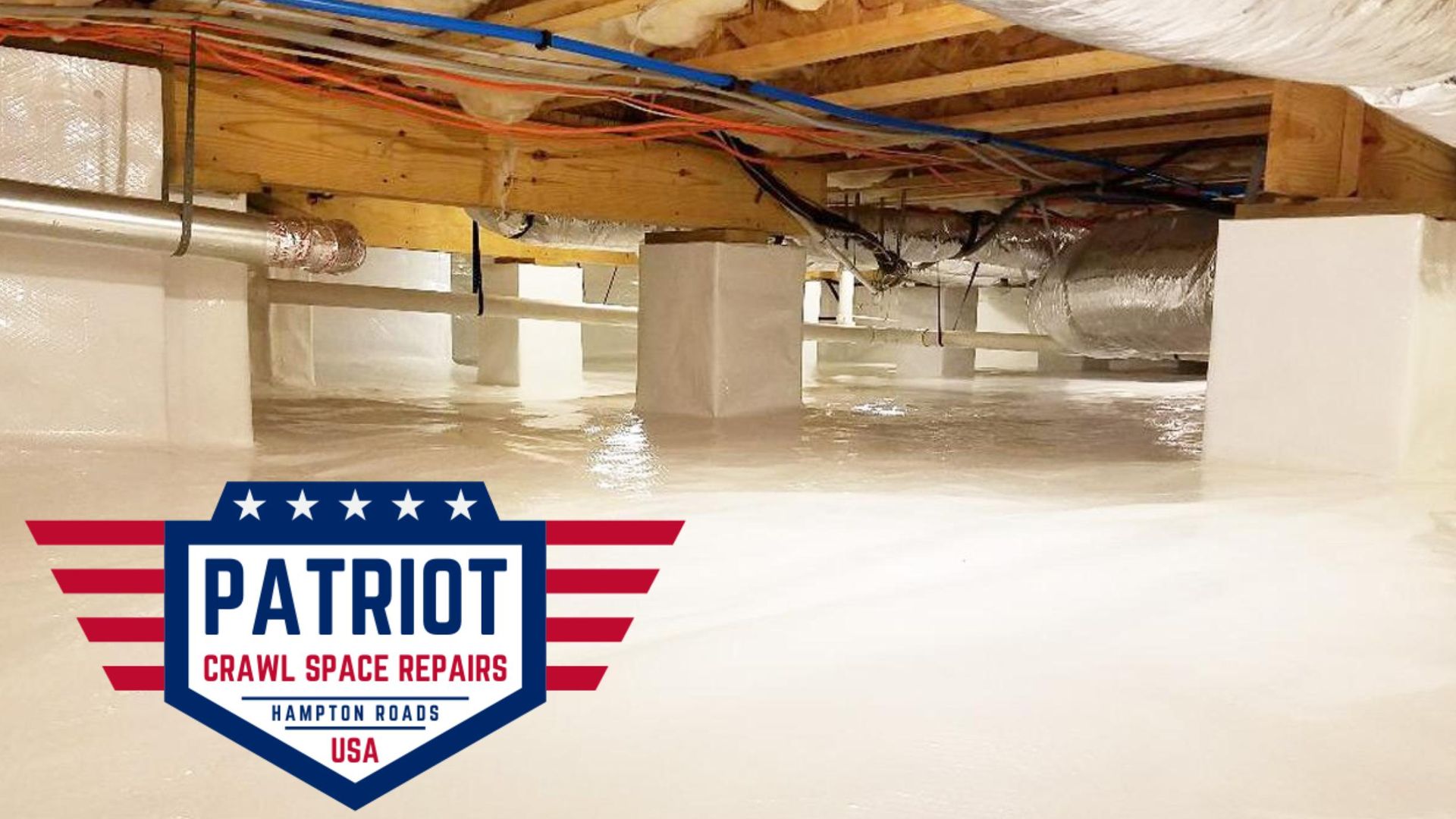 White wall with a prominent diagonal crack; blue door and white trim visible.