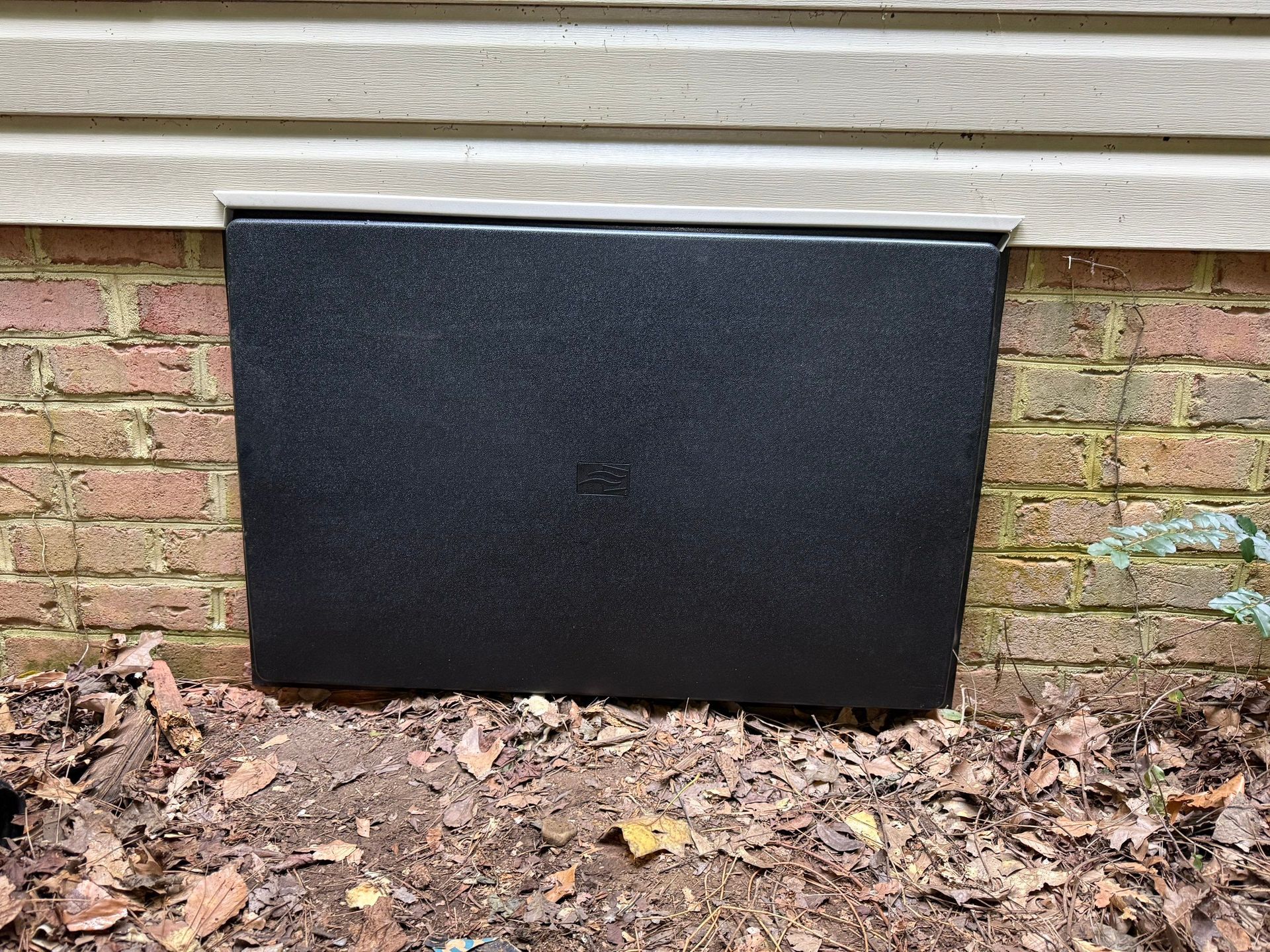 Hybrid encapsulation new sealed crawl space door Running Man neighborhood of Yorktown.